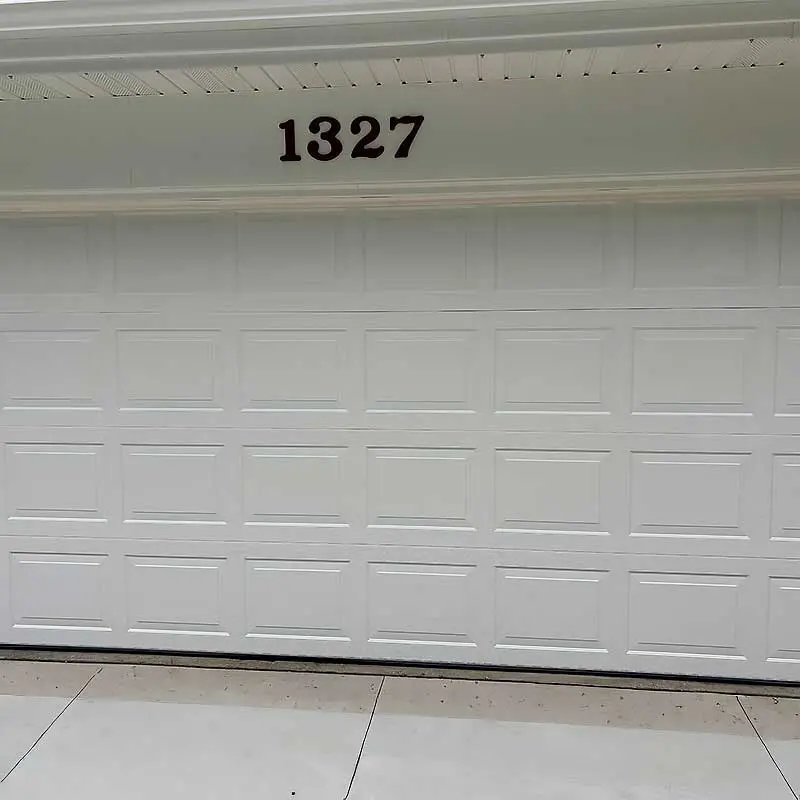 White garage door with the number 1327 above, suitable for garage door repair in Green Bay and Appleton areas.| Bestland Garage Door Service – Green Bay Garage Door Repair